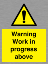 gender-neutral-construction-warning-sign-warning-work-in-progress-above-with-exc~